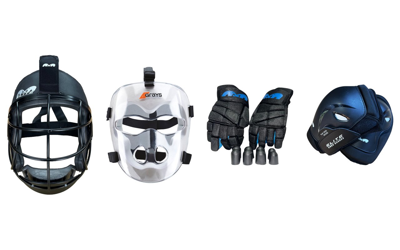 Sprzęt obrońców na karny róg z oferty Field Hockey Zone – maska TK PC Elite z metalową kratką, przezroczysta maska Grays, rękawice TK PC i ochraniacze kolan TK PC Elite